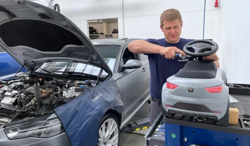 werkplaats top motors